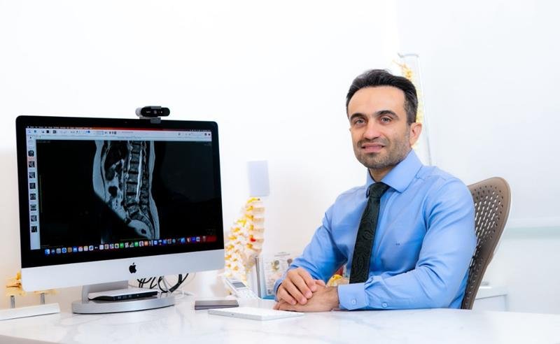 Dores na coluna: ortopedista ou neurocirurgião? Entenda qual especialista procurar e por quê